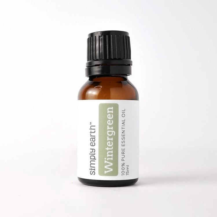Wintergreen essential oil bottle on a white background